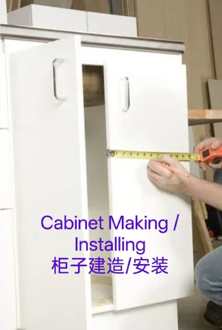White kitchen cabinets being measured during installation